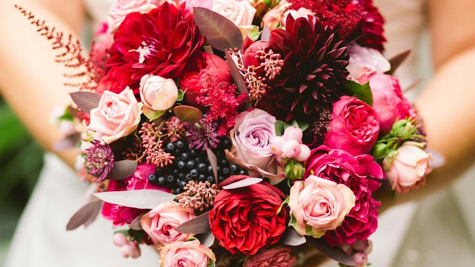 A bride holding a bouquet.