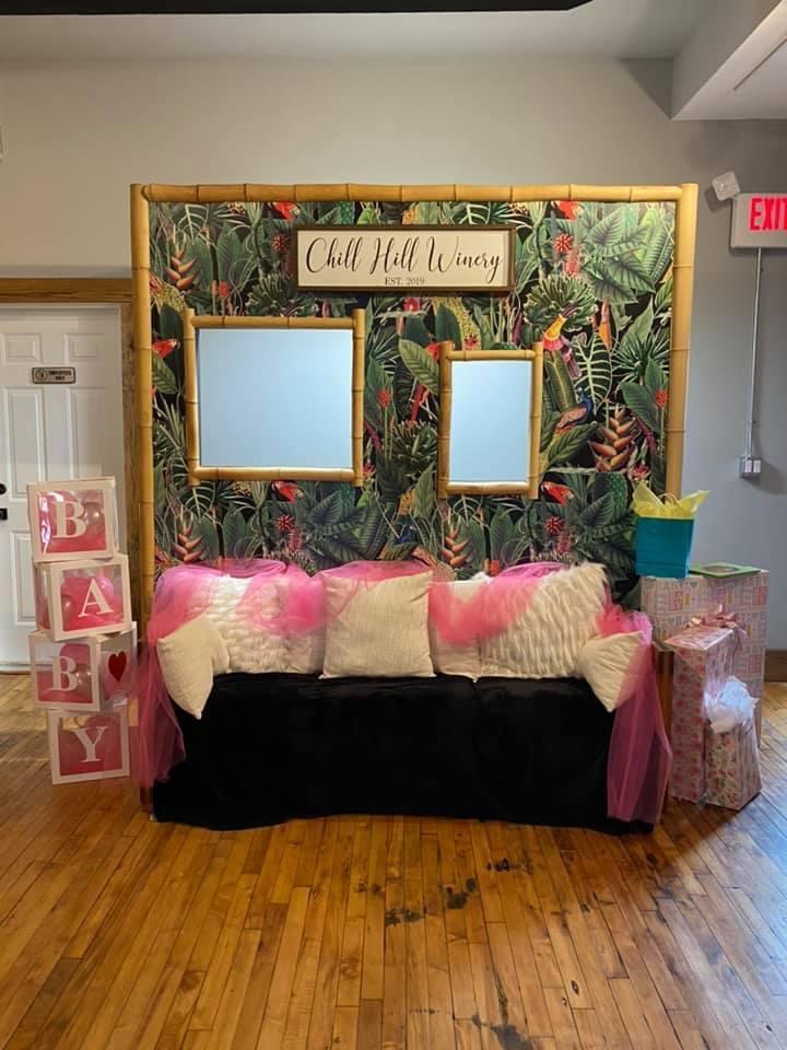 Gift set up on the back bar with balloons