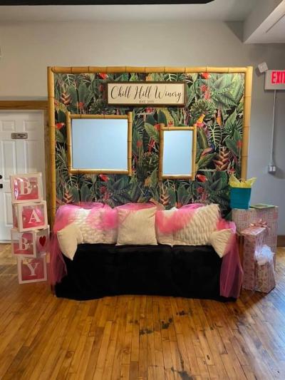 Gift set up on the back bar with balloons