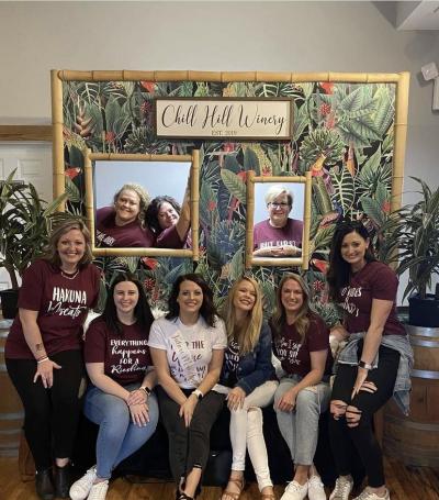 Decorated venue space with tables and white clothe