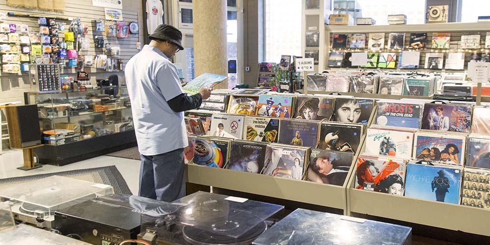 A person shopping in the Arts District.