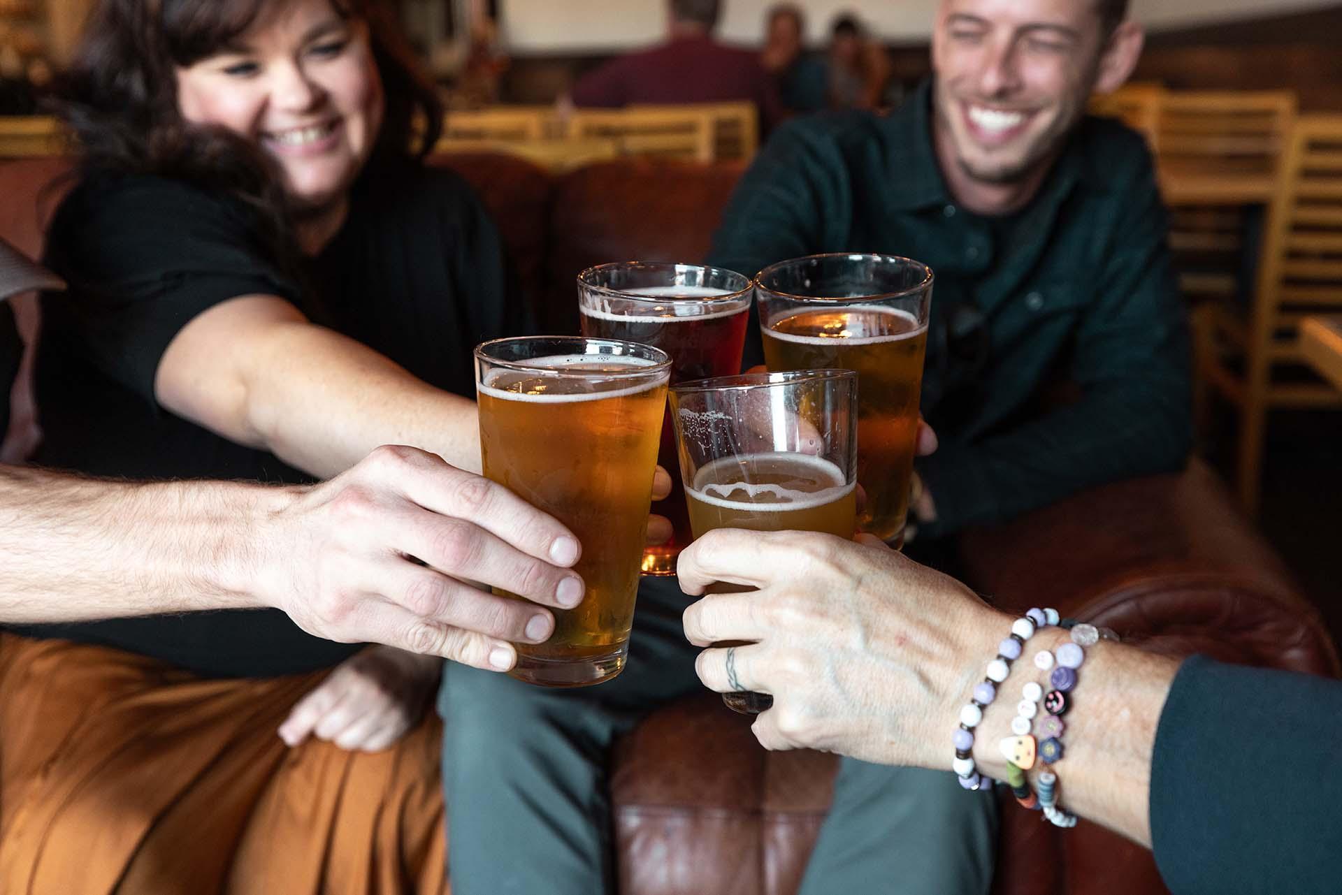 People with drinks at Lake Time Brewing & Spirits