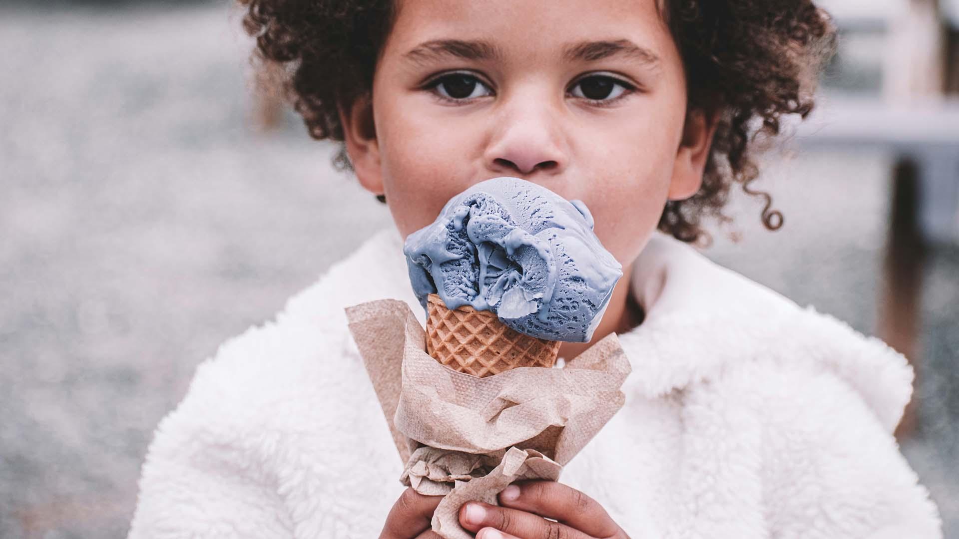 A kid with an ice cream cone.