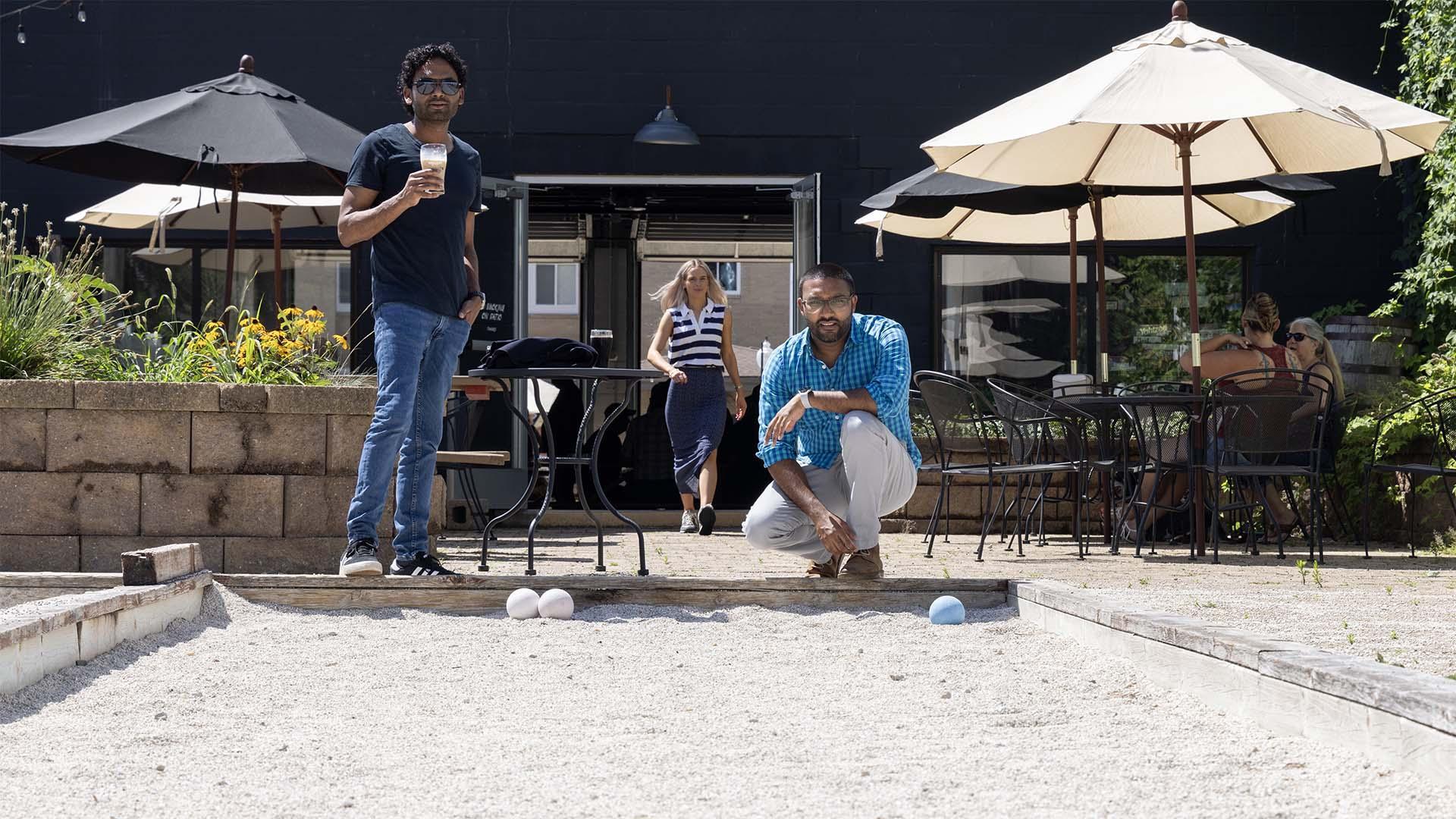 People playing bocce ball at Arclight Brewing Company.