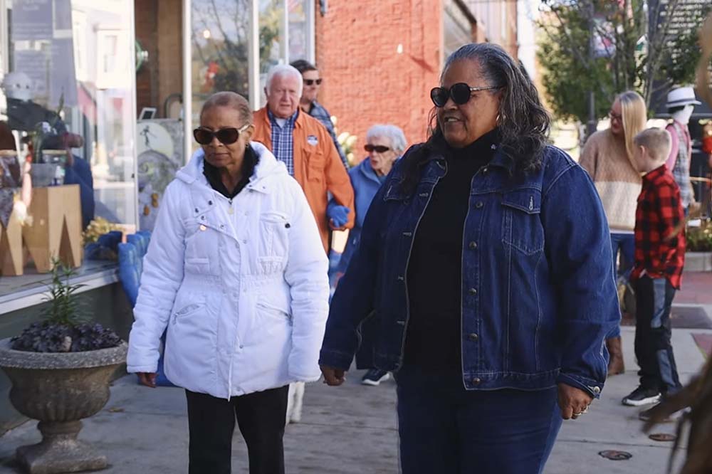 People walking near shops in downtown Buchanan